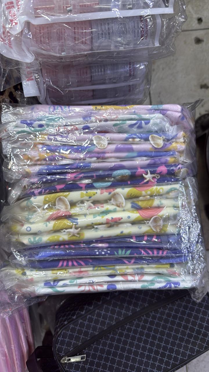 POCHETTES ET TROUSSES